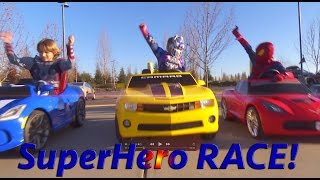 Superheroes Mega Power Wheels Race 3!  5 Ride On Cars! | Gabe and Garrett