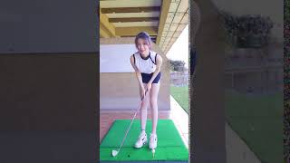 Cute girl playing golf #329