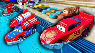 Disney Pixar Cars falling into deep pool, Lightning McQueen, Tow Mater, Mack, Sa
