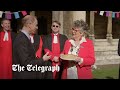 Duke of Edinburgh samples Coronation quiche at Westminster Abbey