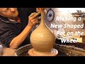 Attempting to Make a Long Neck Pottery Vase on the Wheel