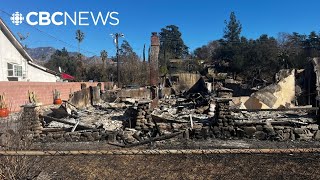 Firefighters make progress on L.A. wildfires as winds ease