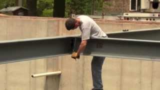 Custom Home Builder Tips - Setting Steel Beams - Divak Developers