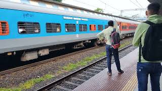 Unscheduled Halt of 11010 Sinhagad Express at Ulhasnagar and Local Arrival.