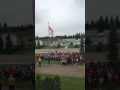 Raising the 150th Canada Day celebration flag