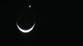 PLANET VENUS  SITTING ON TOP OF THE  CRESCENT MOON
