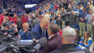 UK Head Coach Mark Pope and former coach John Calipari embrace at Rupp Arena ahead of game