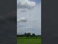 radio towers radiating powerful electromagnetic waves.