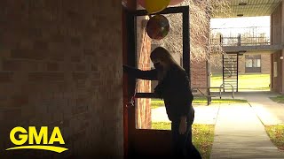 Volunteers deliver cheer to students in quarantine