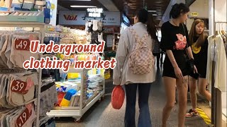 Underground clothing market under pedestrian streets in Chongqing, China