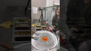 Making rolled ice cream for the pregnant customer?
