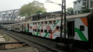 12922 Flying Ranee Express with 75 Years of Independence livery cruises past Lower Parel