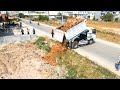 Dump truck 5T unloading soil filling up with Skill operator Bulldozer Working push soil fill