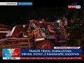 BP: Trailer truck, bumaligtad; driver, patay; 2 pahinante, sugatan