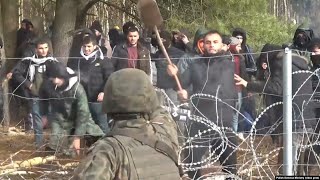 Heightened Tensions On Poland-Belarus Border As Migrants Attempt To Force Down Border Fence