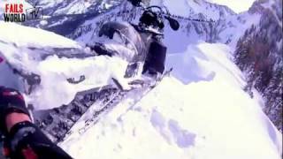 Snowmobile almost falls off cliff AMAZING SAVE (MUST WATCH).