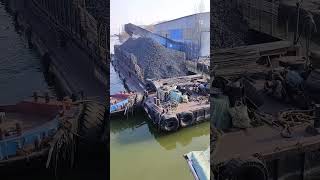 The process of mooring a barge loaded with coal