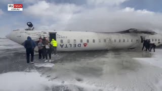 Shocking footage shows flipped Delta plane following crash