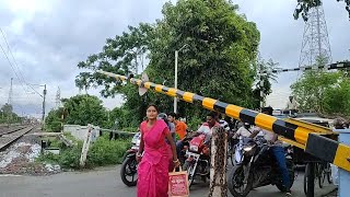 Public Are So Busy To Crossing Railgate : Dangerous Speedy Trains Aggressive Moving out Railgate