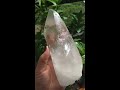 beautiful large lemurian seed crystal with rainbows