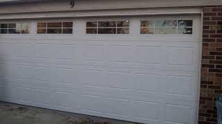 a hormann 2100 new overhead garage door  Installed in Woodridge,IL vinal back insulated