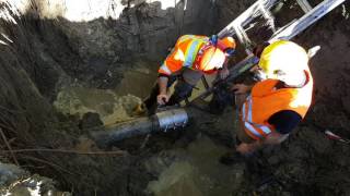 Water main break repair under pressure