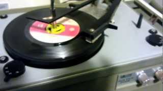 Arvin record player playing 45's