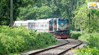 Semi High Speed Train Rupsha Express In a Huge Curve Passing Trough a Semi Forest - Bd Railway