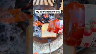 Deliciously cheesy campfire pizza 🍕#pizza #campfirecooking #castiron #camping
