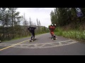 andrew karnowka and greg paproski in a 50 mph longboard drag race