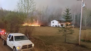 Wildfires rage through Metis community in Alberta