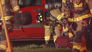 Firefighters pull 3 people from burning home