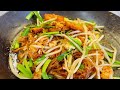 pad thai. quick and easy noodle recipe. homemade pad thai with tamarind paste. beansprouts and chive