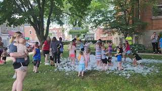 Lincoln Public Library Summer Reading Program participants enjoy a foam cannon