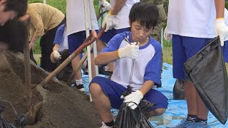 230713南島中学校で災害時の土のう作り体験