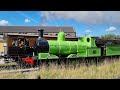 the green dragon runs alongside the vintage train at the keighley and worth valley railway 28 08 21.