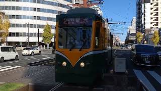 鹿児島市電2系統郡元行き高見馬場停留場到着  Kagoshima City Tram Route 2 for Korimoto arriving at Takamibaba Tram Stop