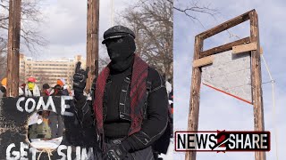 Guillotine erected at Inauguration Day protest against Trump in DC - Interview