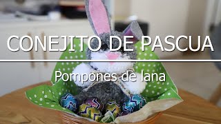 Conejo de Pascua con pompones de lana