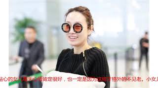 马伊琍带两女儿现身机场，素颜黑超遮面心情超好，身边不见文章