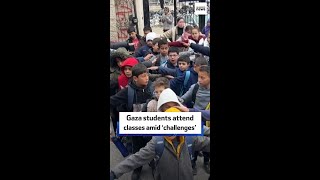 Students attend classes on the second day of school in Gaza City.