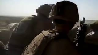 Afghanistan - US Marines return fire after a surprise RPG attack