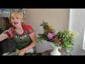 how to make a classic urn flower arrangement floristry flower arranging