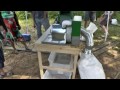 a demonstration of small scale rice processing equipment