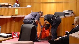 Courtroom fight erupts during murder hearing