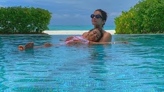 Abhishek Bachchan posts pretty photo of Aishwarya and Aaradhya chilling in pool in Maldives
