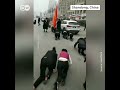 chinese workers forced to go on punishment crawl on streets dw news