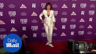 All white now! Susan Sarandon rocks sneakers with suit at Feud - Daily Mail