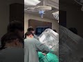 dr. gary jones performing robot assisted dental implant surgery with yomi