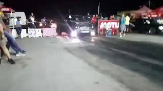 Isuzu. .Drag Battle in Drag park at night. .